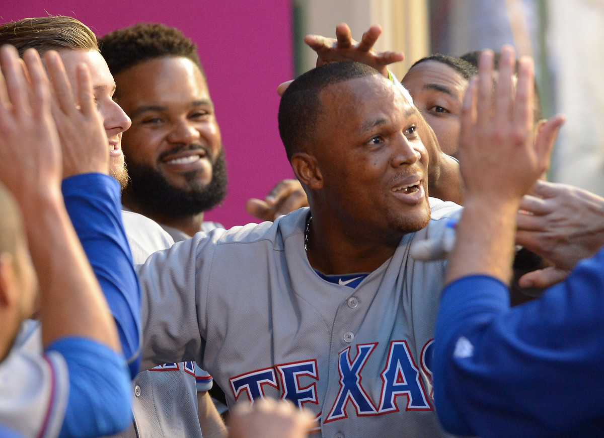 Former Texas Rangers third baseman Adrian Beltre celebrates with teammates after hitting a home run against the Los Angeles Angels in April 2016 at Angel Stadium of Anaheim.