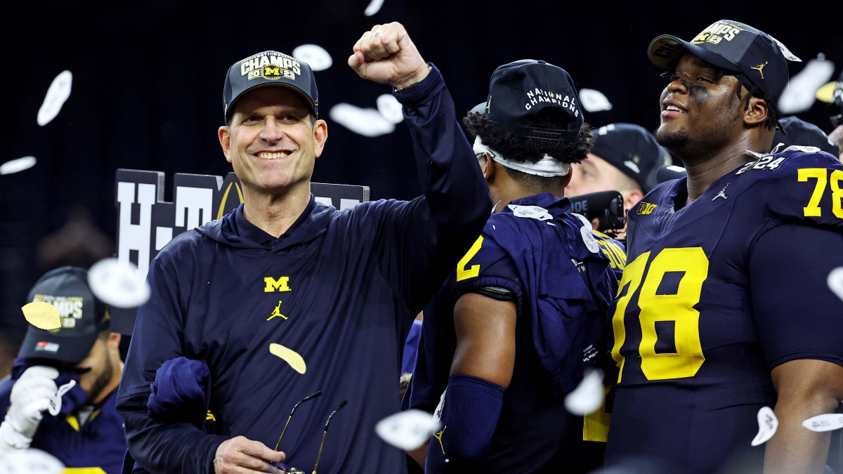 Jim Harbaugh celebrates after winning the national championship