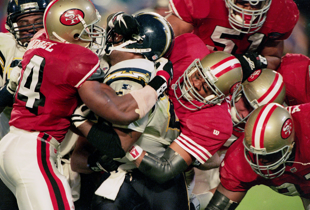 49ers Lee Woodall tackles a San Diego Chargers’ player