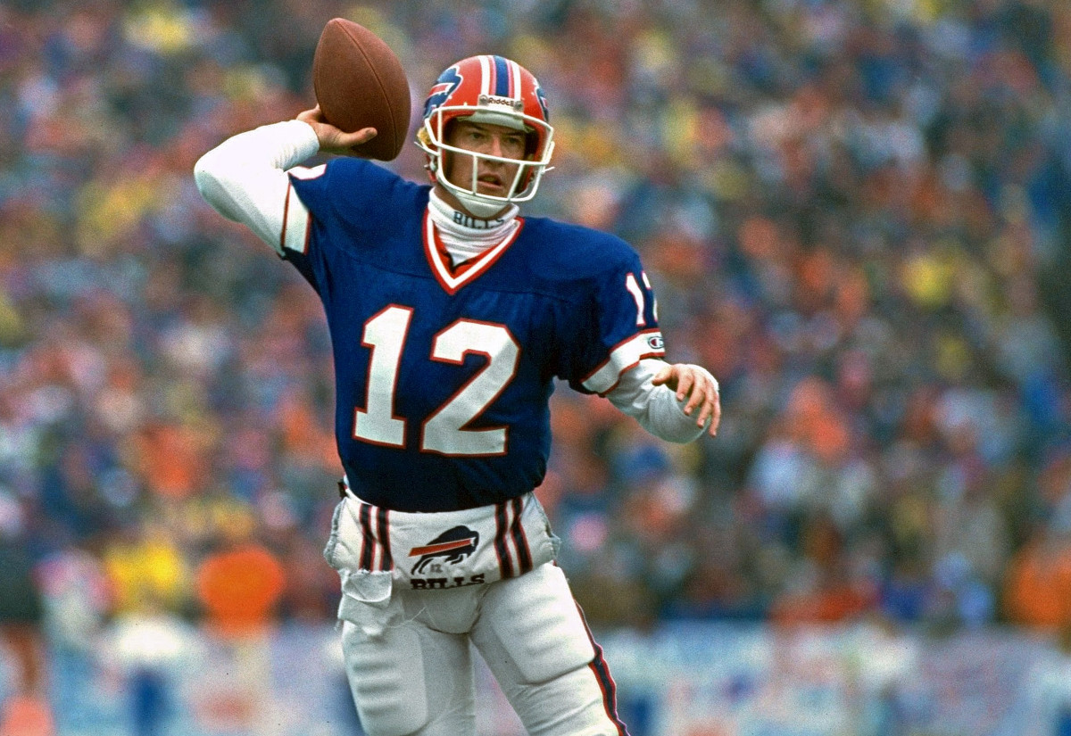 Jim Kelly throws the football