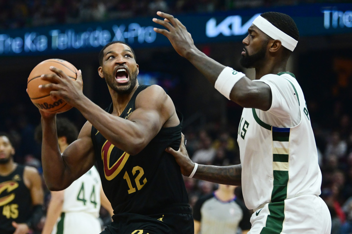 Dec 29, 2023; Cleveland, Ohio, USA; Cleveland Cavaliers center Tristan Thompson (12) drives to the basket against Milwaukee Bucks forward Bobby Portis (9) during the first half at Rocket Mortgage FieldHouse.