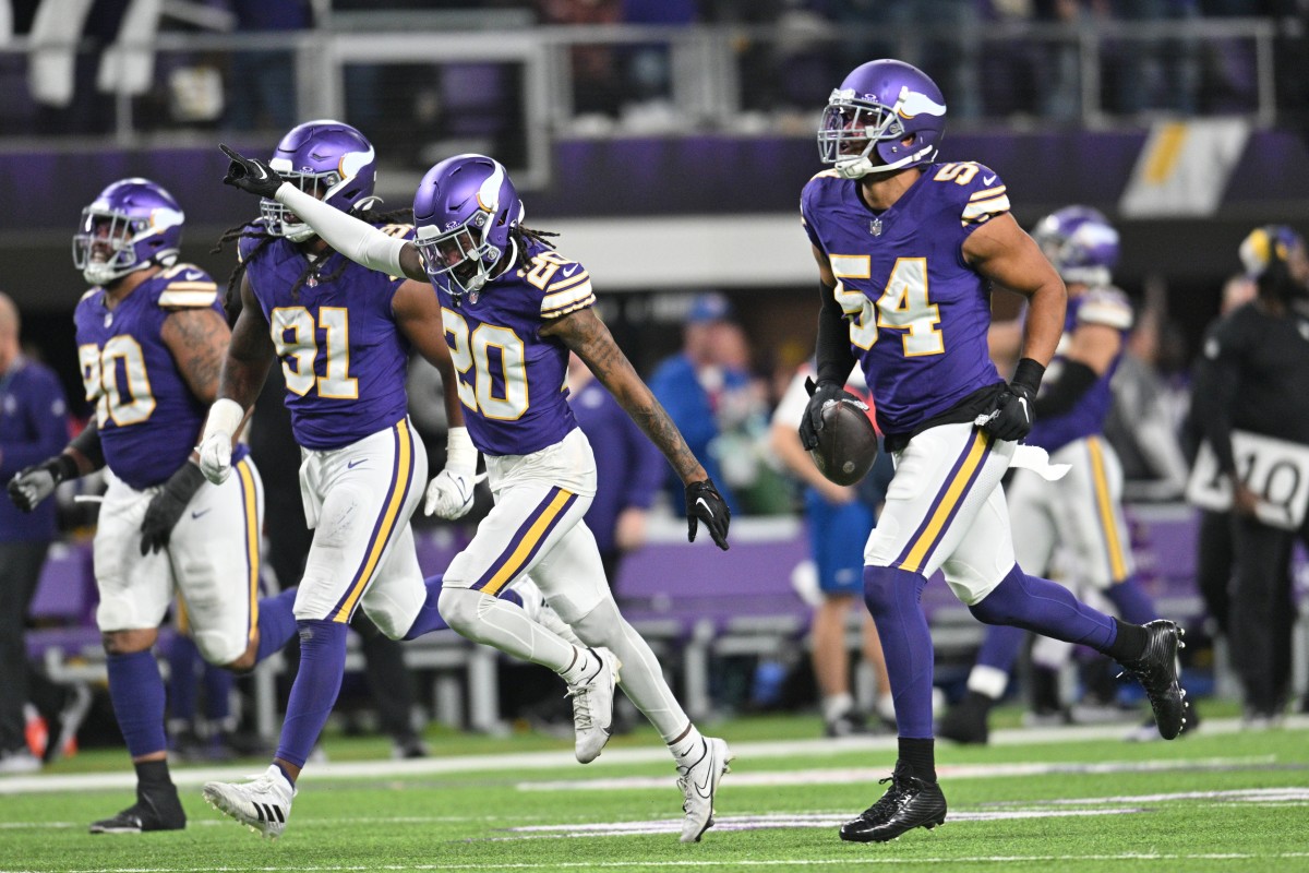 Nov 27, 2023; Minneapolis, Minnesota, USA; Minnesota Vikings linebacker Anthony Barr (54) reacts with safety Jay Ward (20) and linebacker Pat Jones II (91) after a fumble recovery by Barr during the fourth quarter against the Chicago Bears at U.S. Bank Stadium. 