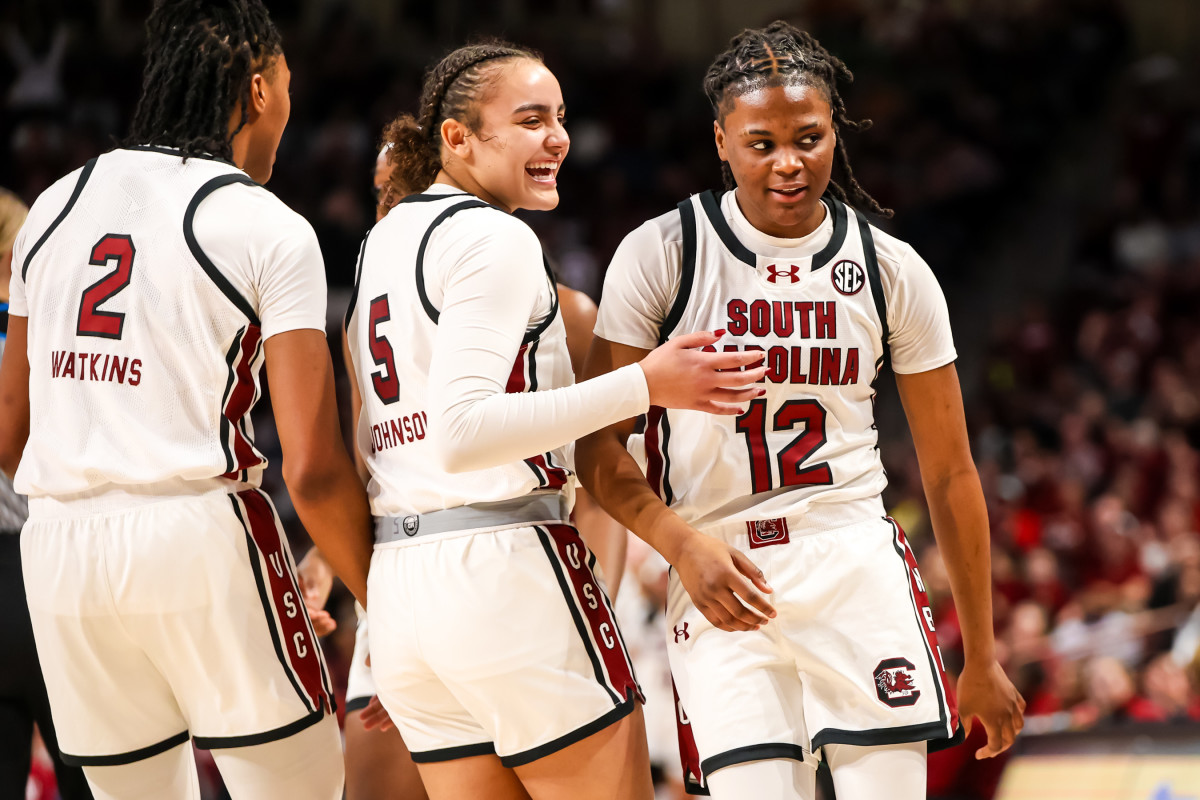 MiLaysia Fulwiley celebrates with teammates after being fouled making a three point basket against Kentucky