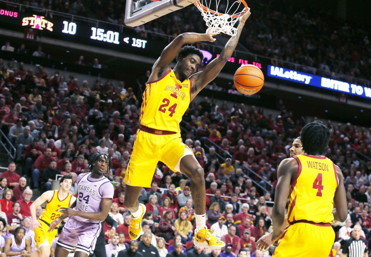 Iowa State Cyclones forward Hason Ward dunks the ball around Kansas State Wildcats forward Arthur Kaluma during a Big 12 game on Jan. 24, 2024, in Ames, Iowa.