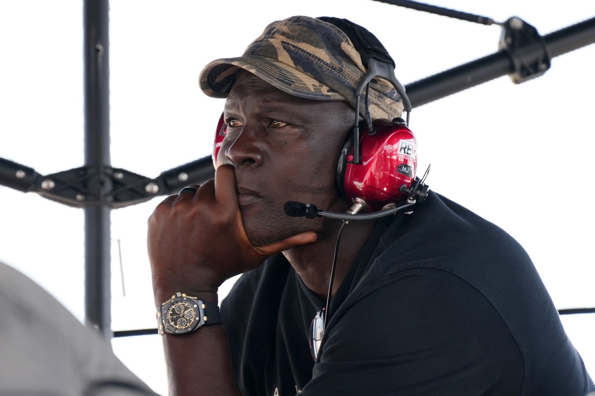 Team co-owner Michael Jordan sits atop of the pitbox during the 4EVER 400 presented by Mobil 1 at Homestead-Miami Speedway.