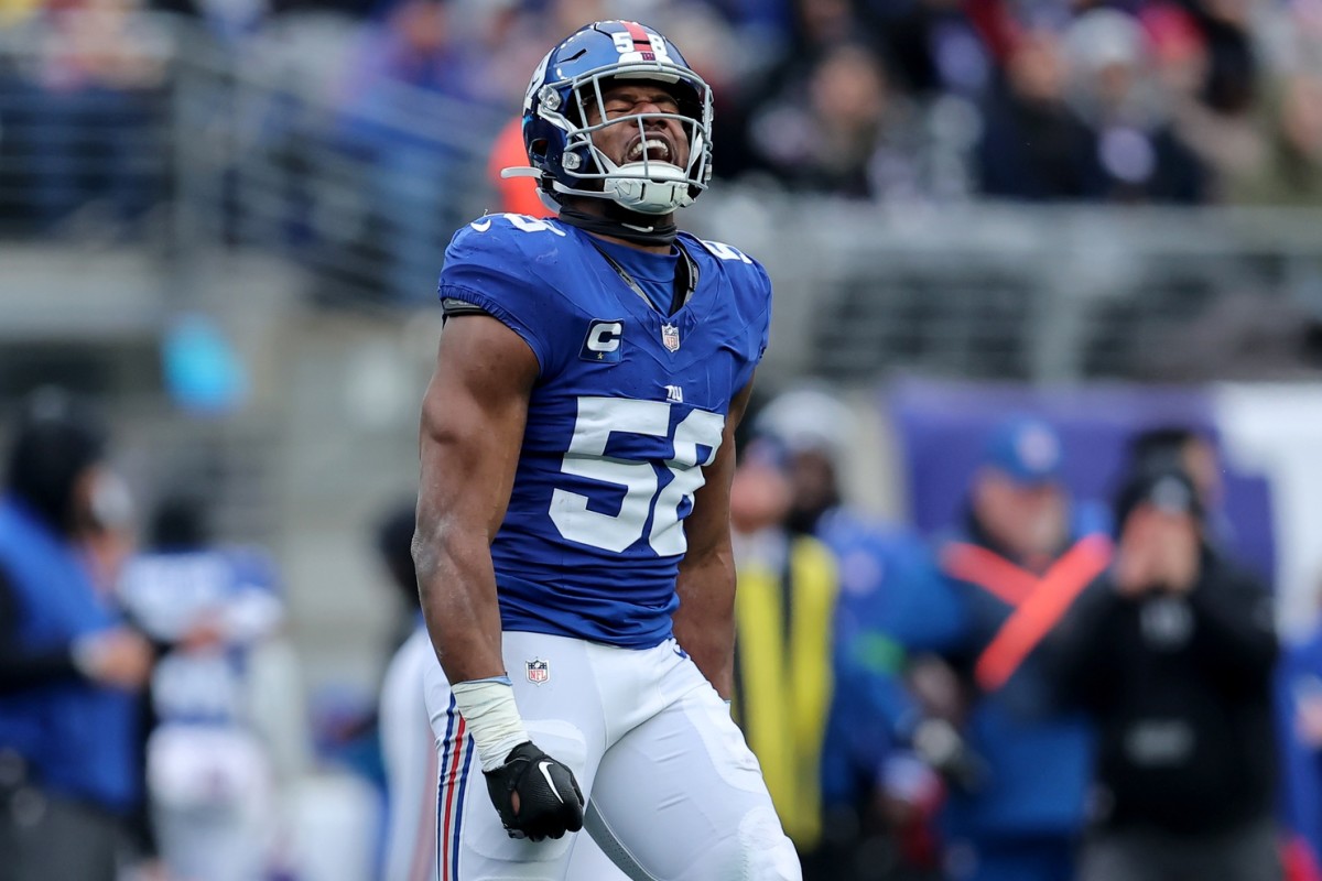 Dec 31, 2023; East Rutherford, New Jersey, USA; New York Giants linebacker Bobby Okereke (58) celebrates his sack against the Los Angeles Rams during the second quarter at MetLife Stadium.