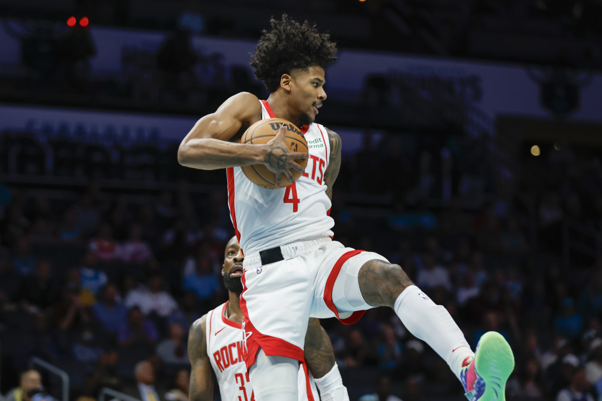 Rockets guard Jalen Green (4) pulls down a rebound against the Charlotte Hornets during the first quarter at Spectrum Center.