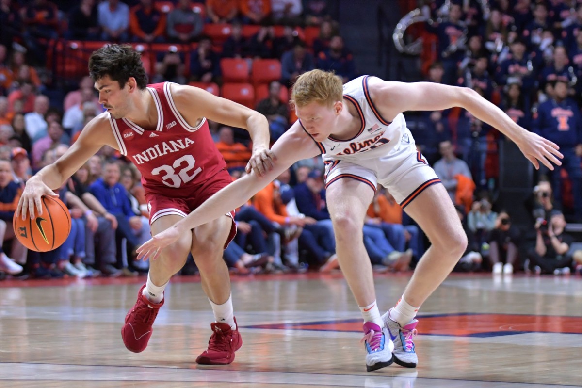 Illinois Fighting Illini guard Luke Goode (10) reaches for the ball against Indiana Hoosiers guard Trey Galloway (32) during the first half at State Farm Center.