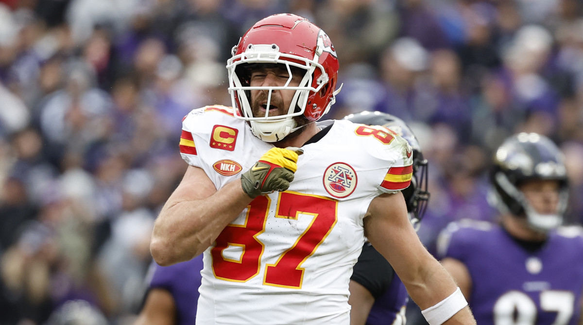 Chiefs tight end Travis Kelce (87) celebrates after scoring a touchdown against the Baltimore Ravens during the first half in the AFC Championship