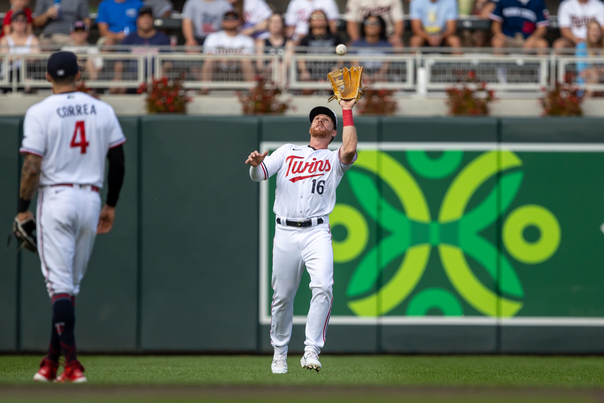 Aug 24, 2023; Minneapolis, Minnesota, USA; Minnesota Twins left fielder Jordan Luplow (16) catches a fly ball against the Texas Rangers in the second inning at Target Field.