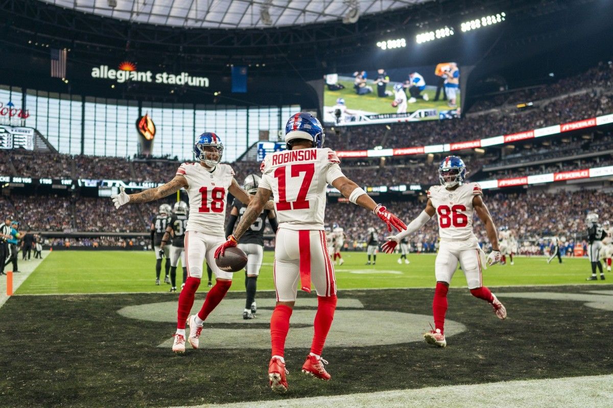 Wan'Dale Robinson celebrates a score.