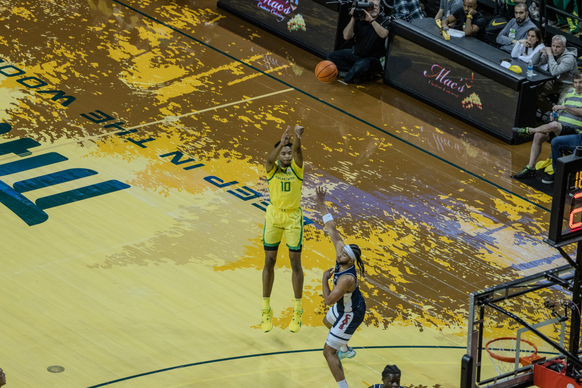 Kwame Evans Jr. shoots a three-pointer against the Arizona Wildcats.