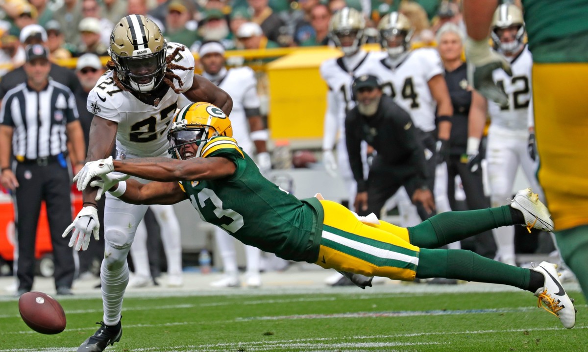 New Orleans Saints cornerback Isaac Yiadom (27) breaks up a pass intended for Green Bay Packers wide receiver Dontayvion Wicks (13). © Dan Powers/USA TODAY NETWORK-Wisconsin / USA TODAY NETWORK