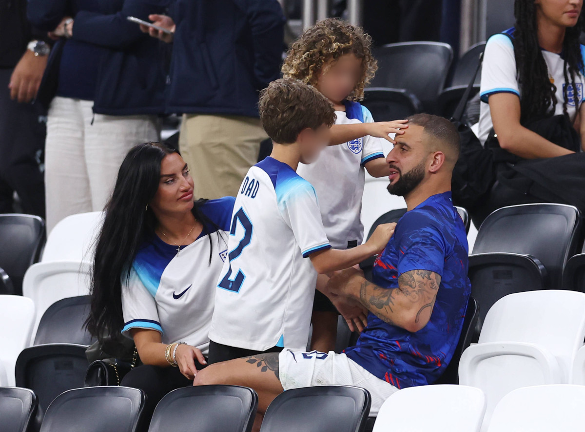Kyle Walker pictured with wife Annie Kilner and two of their children after England's game against Senegal at the 2022 FIFA World Cup in Qatar