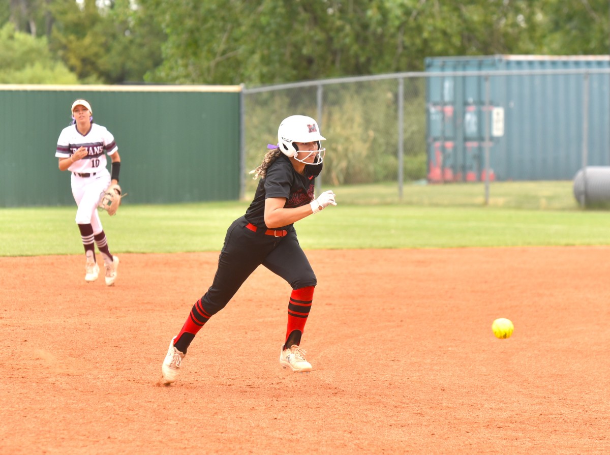 Mustang senior catcher Arionna 'Onna' McElroy equally loves hitting